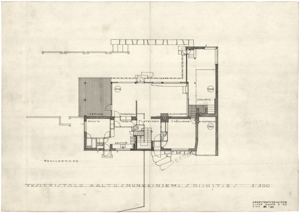 An architectural floor plan on aged paper showing connected rooms, circulation, and dimensions