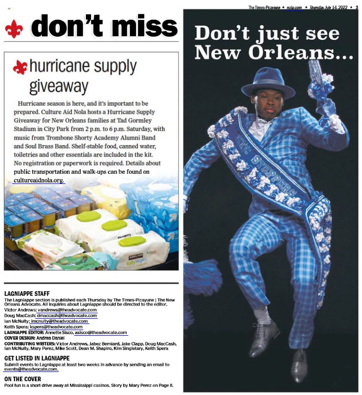 Printed magazine page with a Vue Orleans advertisement featuring the second-line performer